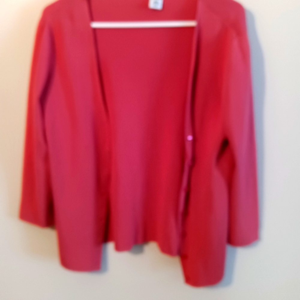 Orange sweater.